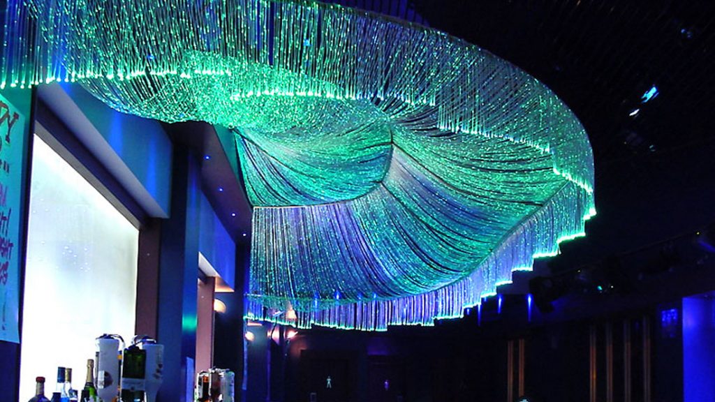 fiberoptic-3 - Laymance Lighting Fiber optic lighting cascading from a ceiling feature in teal and green